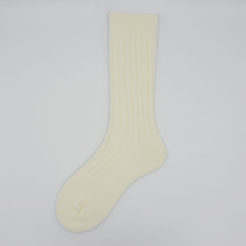 Calza corta in lana vergine a coste...