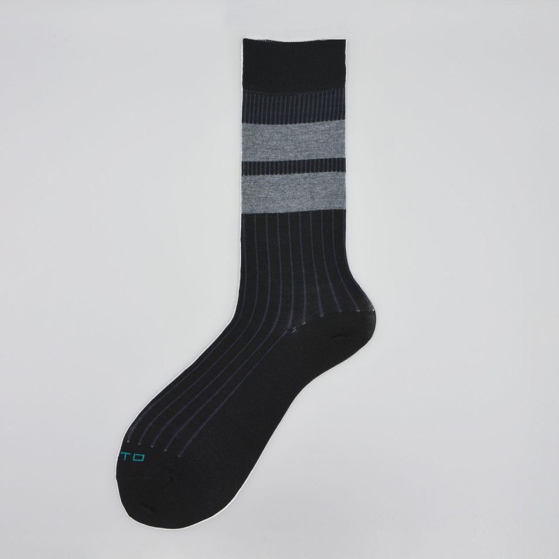 Calza corta in lana vergine a righe...