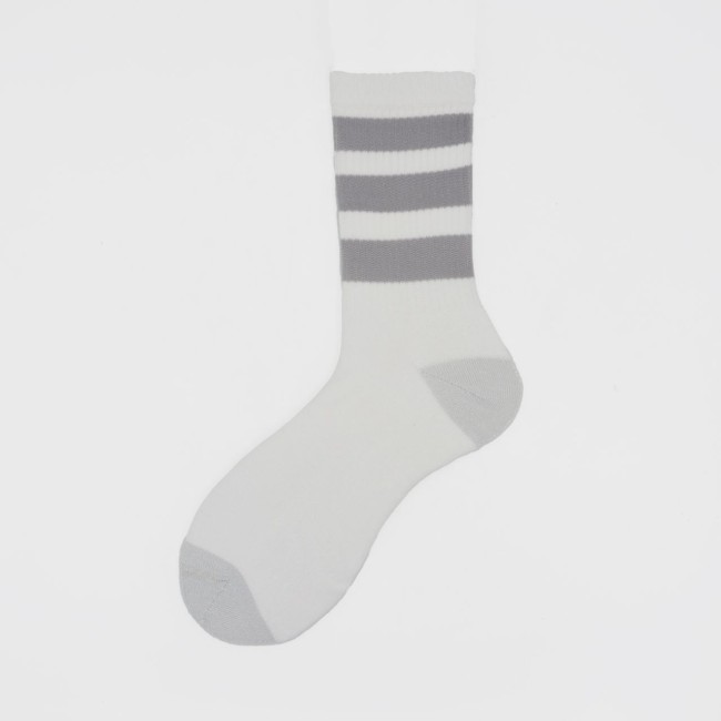 Calza corta in spugna di cotone con polso a righe...